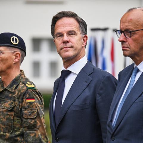 NATO Secretary General Mark Rutte, German Chancellor Friedrich Merz, and Lieutenant General Peter Mirow, commanding general of the 1st German-Dutch Corps, during a visit to the German-Dutch Corps in North Rhine-Westphalia, Münster on October 1, 2026. (Getty Images)