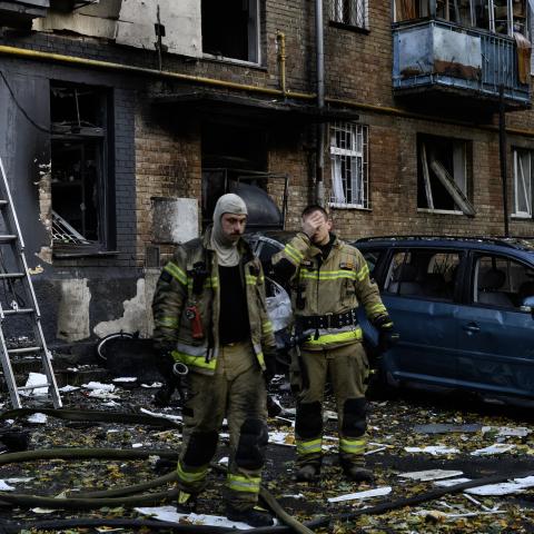Rescuers work outside a damaged five-story residential building following a Russian drone attack in Kyiv on October 7, 2026, amid the Russian invasion of Ukraine. (Getty Images)