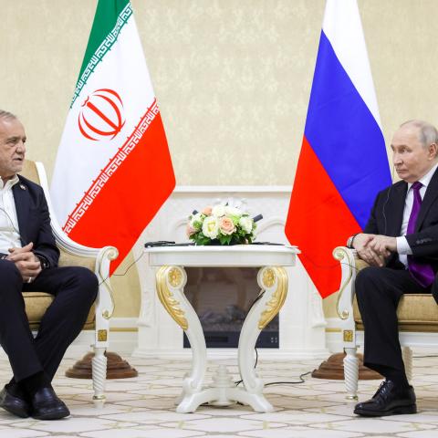 Russia's President Vladimir Putin and Iranian President Masoud Pezeshkian hold a meeting in Turkmenbashi on October 8, 2026. (Getty Images)