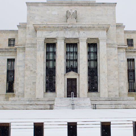 The US Federal Reserve is seen during a snowstorm March 3, 2014 in Washington, DC (KAREN BLEIER/AFP/Getty Images)
