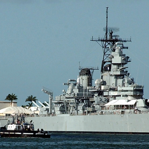 The Military Sealift Command (MSC) hospital ship USNS Mercy (T-AH 19) passes the battleship USS Missouri (BB 63) January 11, 2005 in Pearl Harbor, Hawaii. (Devin Wright/U.S. Navy via Getty Images)