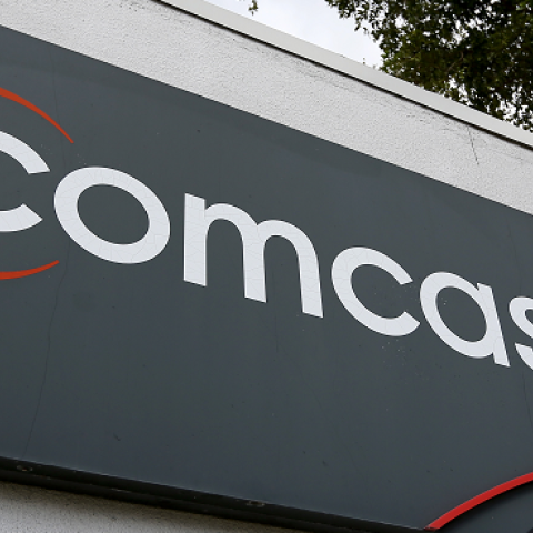 A Comcast sign is seen at one of their centers on February 13, 2014 in Pompano Beach, Florida. (Joe Raedle/Getty Images)