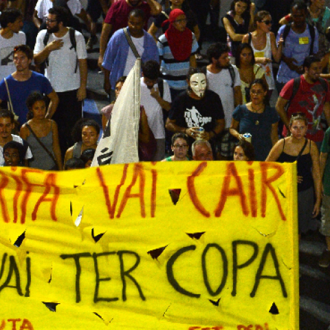 Demonstrators march during a protest against a rise on public bus fares and the costs of the Brazil 2014 FIFA World Cup, Rio de Janeiro, Brazil, February 13, 2014. (CHRISTOPHE SIMON/AFP/Getty Images)