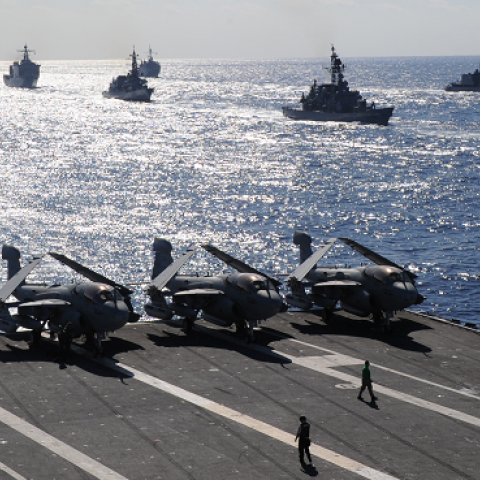 US and Japanese warships follow US aircraft carrier USS George Washington during a US-Japan military exercise at the Pacific Ocean on December 10, 2010. (TOSHIFUMI KITAMURA/AFP/Getty Images)