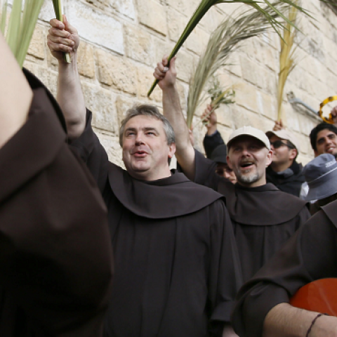 Franciscan fryers in the traditional Palm Sunday procession from Mt. Olives to Jerusalem's Old City on April 13, 2014. (GALI TIBBON/AFP/Getty Images)