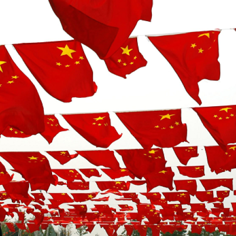 A national flag show at Chaoyang park in Beijing, China, September 30, 2006 (China Photos/Getty Images)
