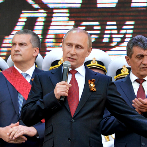 Russian President Vladimir Putin speaks during his visit to the Crimean port of Sevastopol on May 9, 2014. (YURI KADOBNOV/AFP/Getty Images)