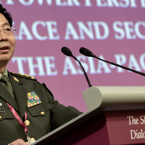 Deputy Chief of the General Staff of the People's Liberation Army Wang Guanzhong speaks at the 13th International Institute for Strategic Studies Shangri-La Dialogue in Singapore on June 1, 2014. (ROSLAN RAHMAN/AFP/Getty Images)