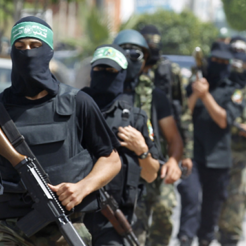 Palestinian militants of the Ezzedine al-Qassam Brigades, Hamas's armed wing, parade in Rafah, southern Gaza Strip, on May 29, 2014. (SAID KHATIB/AFP/Getty Images)