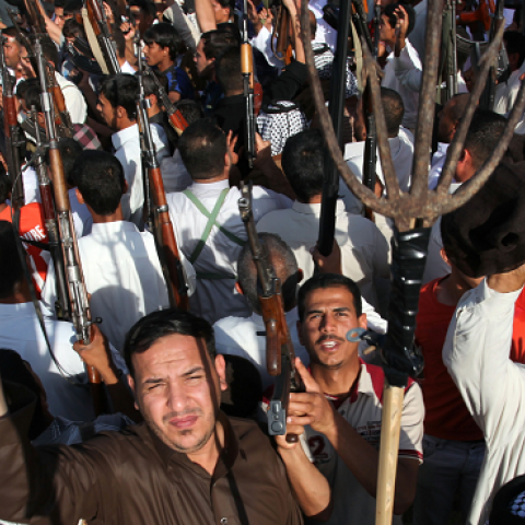 Iraqi Shiite tribesmen gather to join Iraqi security forces in the fight against Jihadist militants, Najaf, Iraq, June 16, 2014. (HAIDAR HAMDANI/AFP/Getty Images)