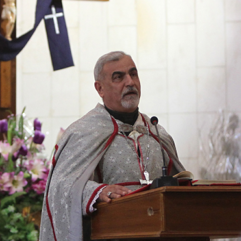 Iraqi priest Monsignor Pios Cacha celebrating a mass at the Mar Yussef Church in central Baghdad, February 22, 2013. (AHMAD AL-RUBAYE/AFP/Getty Images)