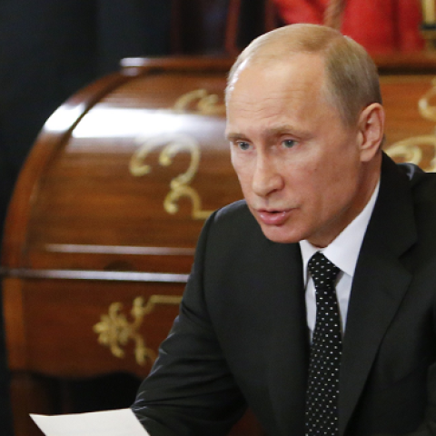 Russia's President Vladimir Putin (C) Tajikistan's President Emomali Rahmon (R) and Armenia's President Serzh Sarkisian of the Collective Security Treaty Organization (CSTO) at the Kremlin in Moscow, on May 8, 2014. (SERGEI KARPUKHIN/AFP/Getty Images)
