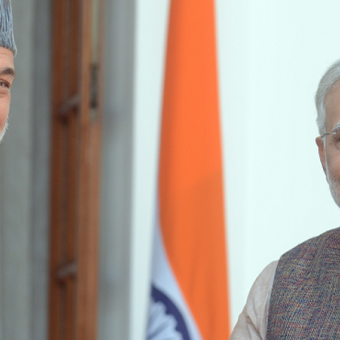 India's Prime Minister Narendra Modi (R) shakes hands with Afghanistan President Hamid Karzai during a meeting in New Delhi on May 27, 2014.(RAVEENDRAN/AFP/Getty Images)