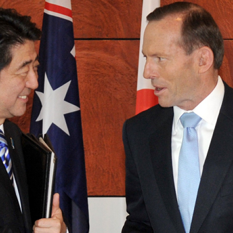 Japanese Prime Minister Shinzo Abe (L) and Australian Prime Minister Tony Abbott (R) at Parliament House in Canberra on July 8, 2014. (MARK GRAHAM/AFP/Getty Images)