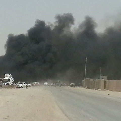 Bombed police checkpoint, Tuz Khurmatu, Iraq, June 9, 2014 (Marwan Ibrahim/AFP/Getty Images).