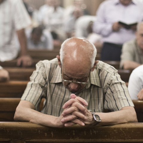 Egyptian Coptic Christians at the Virgin Mary church on May 16, 2014 in Cairo's Road al-Farag district. (VIRGINIE NGUYEN HOANG/AFP/Getty Images)