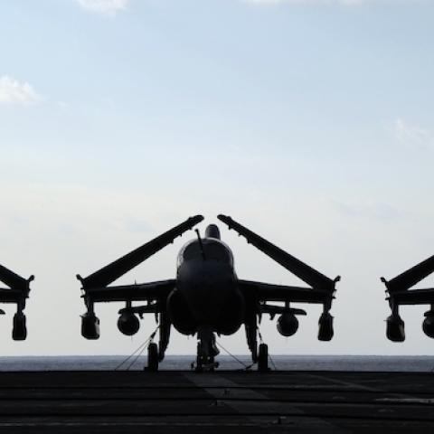 Three electronic warfare aircrafts, EA-6B 'Prowler', are parked on the flight deck of US aircraft carrier USS George Washington, December 10, 2010. (TOSHIFUMI KITAMURA/AFP/Getty Images)