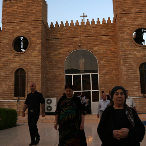 Iraqi Christians leave Saint-Joseph church after a mass on July 20, 2014 in Arbil. (SAFIN HAMED/AFP/Getty Images)