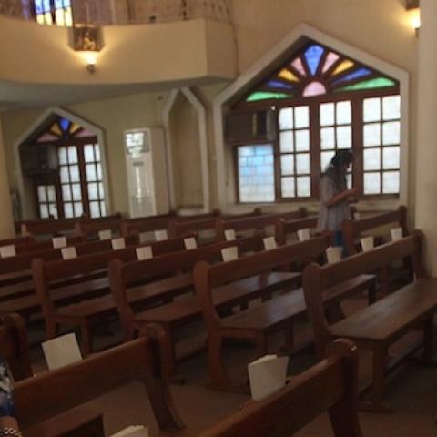 Iraqi Christians attend Sunday mass at the Virgin Mary Chaldean church in the Karrada neighborhood of the capital Baghdad on July 27, 2014. (AHMAD AL-RUBAYE/AFP/Getty Images)
