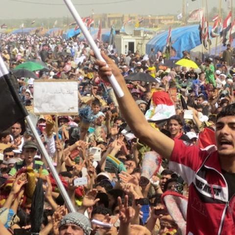 Iraqi demonstrators shout slogans during an anti-government protest in the western city of Ramadi on March 15, 2013. (AZHAR SHALLAL/AFP/Getty Images)