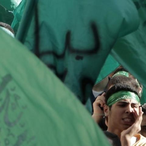 Palestinian supporters of Hamas shout anti-Israeli slogans during a demonstration in the West Bank city of Nablus on August 4, 2014. (JAAFAR ASHTIYEH/AFP/Getty Images)