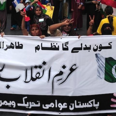 Pakistani supporters of preacher Tahir-ul-Qadri protest in Karachi on June 19, 2014. (ASIF HASSAN/AFP/Getty Images)