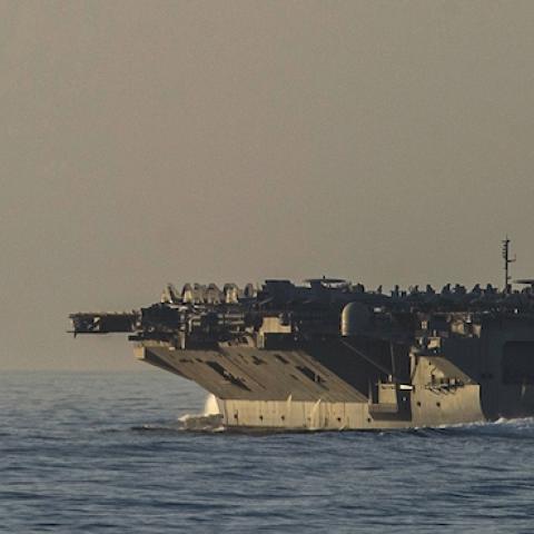 The aircraft carrier USS George H.W. Bush transits the Strait of Hormuz, June 14, 2014. (U.S. Navy photo by Petty Officer 3rd Class Scott Barnes)