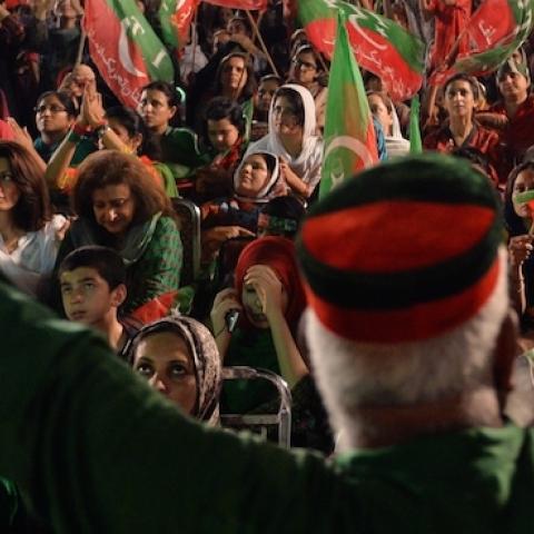 Pakistani supporters of opposition politician Imran Khan listen to his speech during an anti-government protest in front of the Parliament in Islamabad on August 24, 2014. (AAMIR QURESHI/AFP/Getty Images)