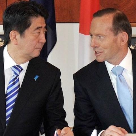 Japanese Prime Minister Shinzo Abe (L) and Australian Prime Minister Tony Abbott (R) at Parliament House in Canberra on July 8, 2014. (MARK GRAHAM/AFP/Getty Images)