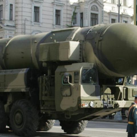 A Russian policeman guards in front of Topol-M ICBM in Moscow on May 5, 2008. (ALEXANDER NEMENOV/AFP/Getty Images)