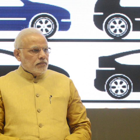 Indian Prime Miniser Narendra Modi (C) launches the "Make In India" project as Minister for Commerce and Industry Nirmala Sitaraman looks on in New Delhi on September 25, 2014. (RAVEENDRAN/AFP/Getty Images)