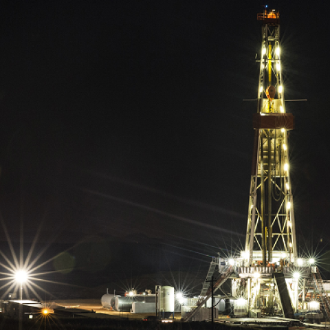 An oil derrick drills in the Bakken shale formation on July 23, 2013 outside Watford City, North Dakota. (Andrew Burton/Getty Images)