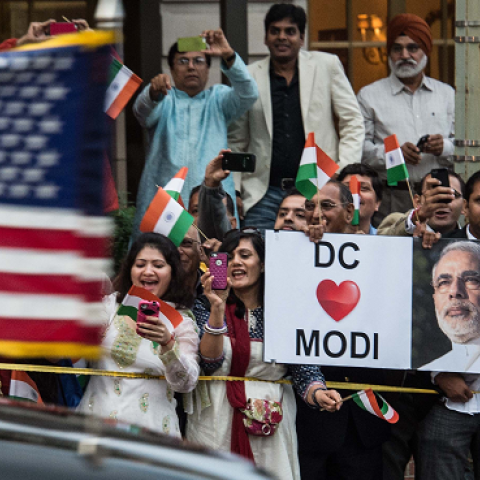 Wellwishers greet Indian Prrime Minister Narendra Modi as he arrives at the Indian embassy in Washington on September 30, 2014. (NICHOLAS KAMM/AFP/Getty Images)