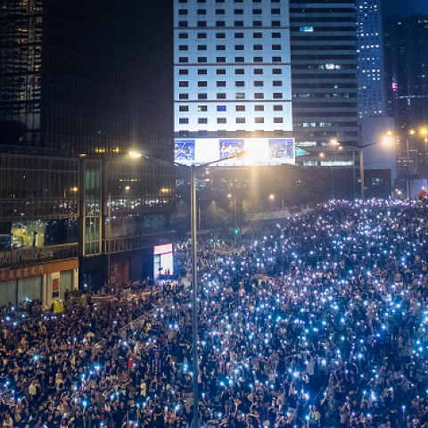 Pro-democracy demonstrators gather for the third night in Hong Kong on September 30, 2014. (PHILIPPE LOPEZ/AFP/Getty Images)