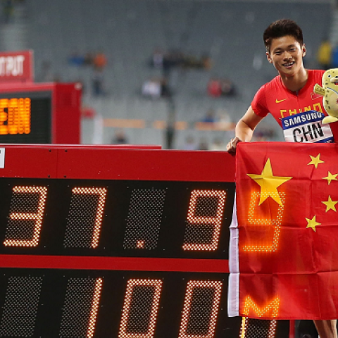 Chen Shiwei, Xie Zhenye, Su Bingtian and Zhang Peimeng of China celebrate claiming the Gold medal in the Men's 4x100m Relay Final of the 2014 Asian Games on October 2, 2014 in Incheon, South Korea. (Brendon Thorne/Getty Images)