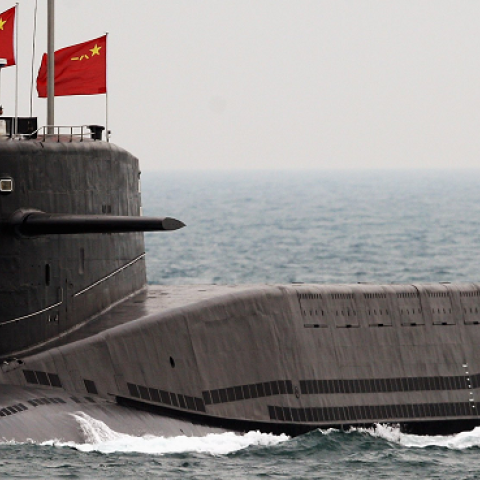A Chinese Navy submarine attends an international fleet review to celebrate the 60th anniversary of the founding of the People's Liberation Army Navy on April 23, 2009 off Qingdao in Shandong Province. (Guang Niu/AFP/Getty Images)