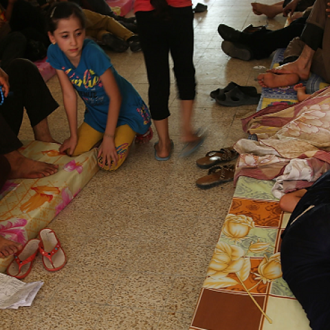Displaced Iraqi Christians sleep inside of Saint Joseph's church after having to flee their district on June 26, 2014 in Erbil, Iraq. (Spencer Platt/Getty Images)