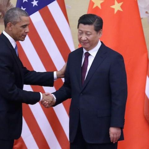U.S. President Barack Obama (L) shakes hands with Chinese President Xi Jinping (R) after a joint press conference at the Great Hall of People on November 12, 2014 in Beijing, China. (Feng Li/Getty Images)