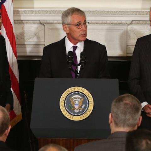U.S. Secretary of Defense Chuck Hagel (C) speaks as President Barack Obama (L) and Vice President Joe Biden look on during a press conference announcing Hagel's resignation, November 24, 2014. (Chip Somodevilla/Getty Images)