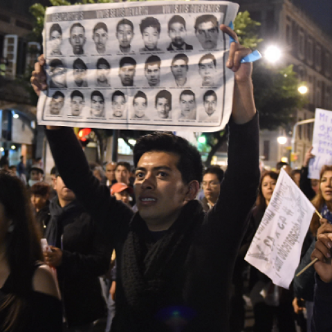 People demonstrate against the presumed massacre of 43 students, in Mexico City, on November 20, 2014. (YURI CORTEZ/AFP/Getty Images)