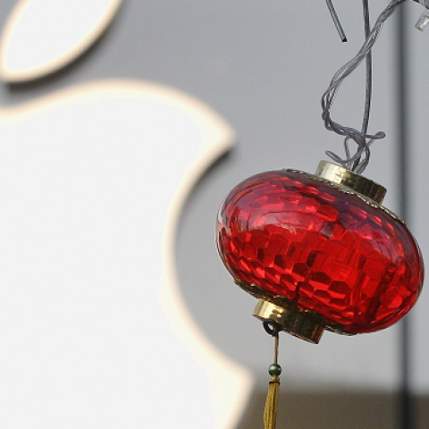 A red lantern lamp is seen in front of the Apple's Beijing flagship store on January 13, 2012 in Beijing, China. (Feng Li/Getty Images)