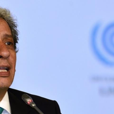 COP20 President and Peruvian Minister of Environment Manuel Pulgar slams his mallet on December 14, 2014, during the marathon UN talks in Lima. (CRIS BOURONCLE/AFP/Getty Images)