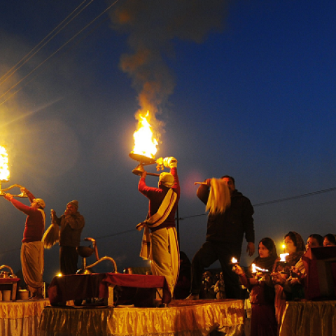 Indian Hindu priests perform an evening prayer ritual known as Arti at the Sangam, the confluence of the holy rivers Ganges and Yamuna and mythical Saraswati, during the annual Magh Mela in Allahabad on January 5, 2015. (Sanjay Kanojia/AFP/Getty Images)