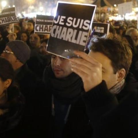 People hold placards reading in French 'I am Charlie' during a gathering on the Place de Republique in Paris, on January 8, 2015. (KENZO TRIBOUILLARD/AFP/Getty Images)