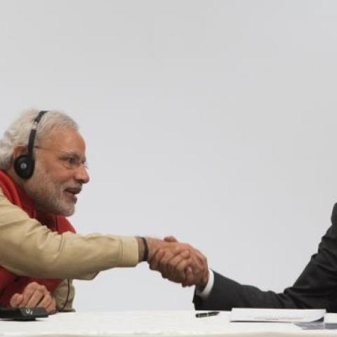 Indian Prime Minister Narendra Modi and US President Barack Obama shake hands during the India-US Business Summit in New Delhi on January 26, 2015. (SAUL LOEB/AFP/Getty Images)