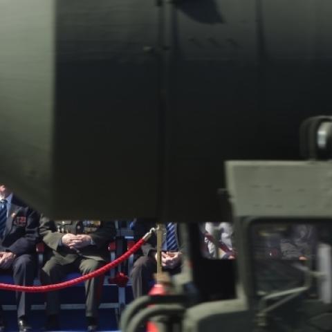 Russian President Putin (bottom L) and Prime Minister Dmitry Medvedev (bottom 2nd L) at the Red Square in Moscow, on May 9, 2013,  Topol intercontinental ballistic missile launchers in the foreground (ALEXEY DRUZHININ/AFP/Getty Images)