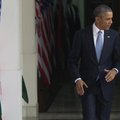 Indian Prime Minister Narendra Modi (R) and US President Barack Obama walk prior to meetings at Hyderabad House in New Delhi, India, January 25, 2015. (SAUL LOEB/AFP/Getty Images)