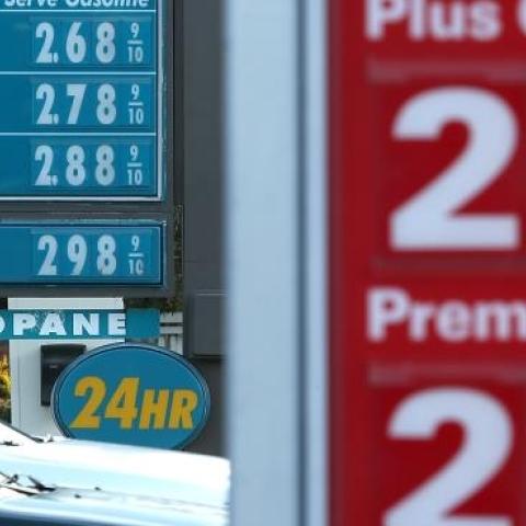Drivers pass by gas prices that are displayed at Valero and 76 gas stations on February 9, 2015 in San Rafael, California. (Justin Sullivan/Getty Images)