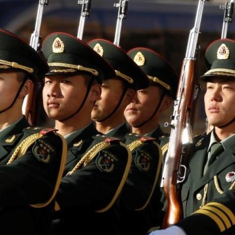Members of the Chinese Army honor guard march at an arrival ceremony at Bayi Building January 10, 2011 in Beijing, China. (Larry Downing-Pool/Getty Images)