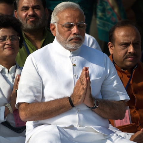 India Prime Minister Narendra Modi (C) pays tributes at Rajghat, memorial of Mahatama Gandhi in New Delhi on May 26, 2014.(PRAKASH SINGH/AFP/Getty Images)